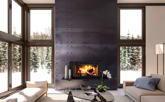 wood fire insert in modern home with large windows